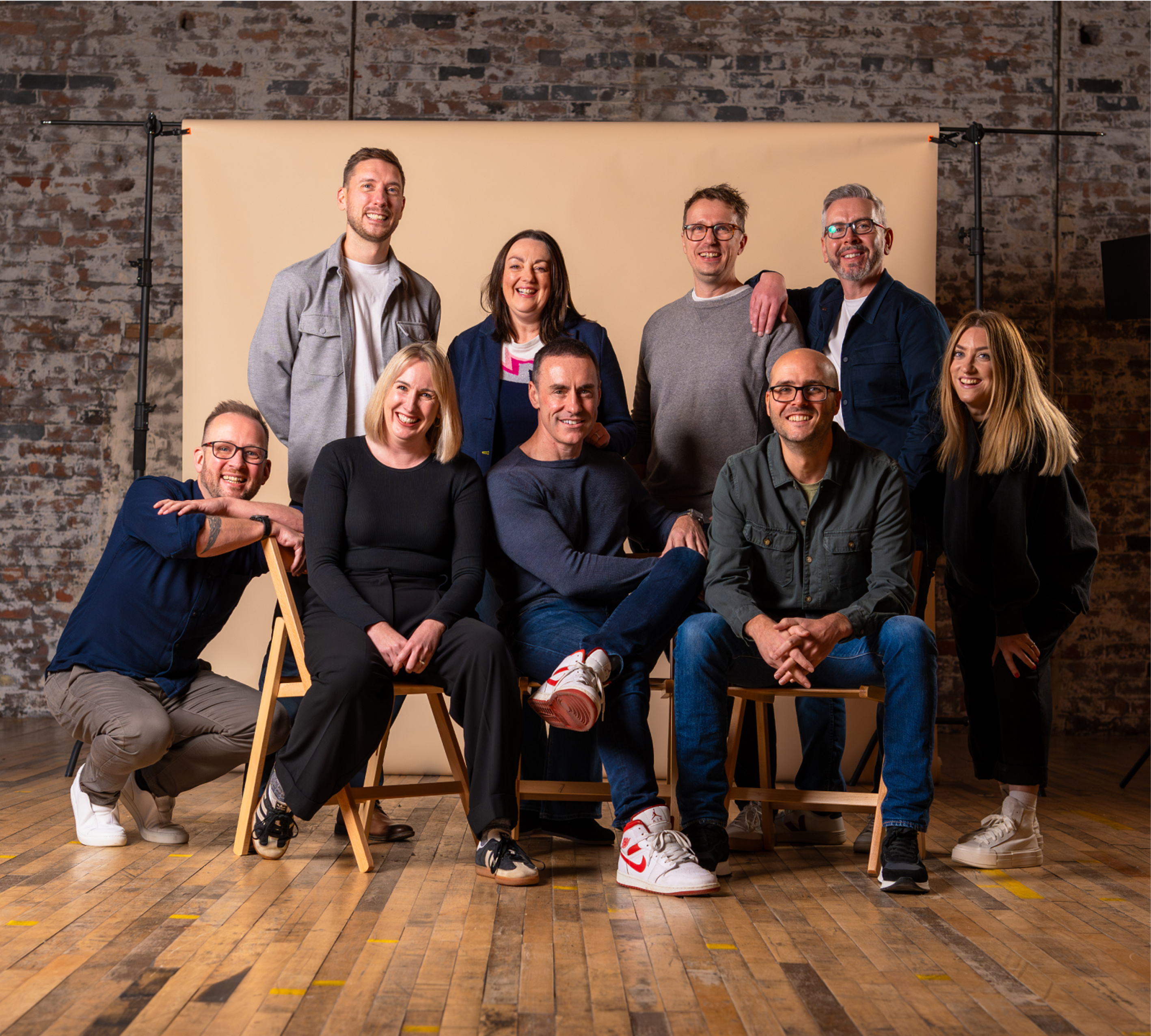 a group of people posing for a photo
