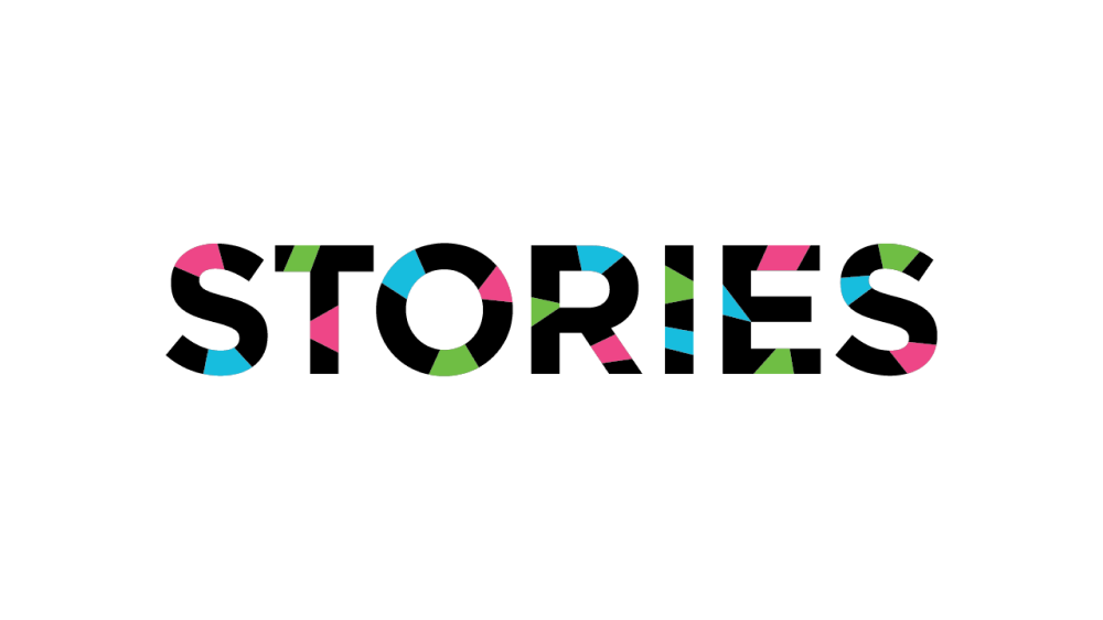 a colorful text with black letters