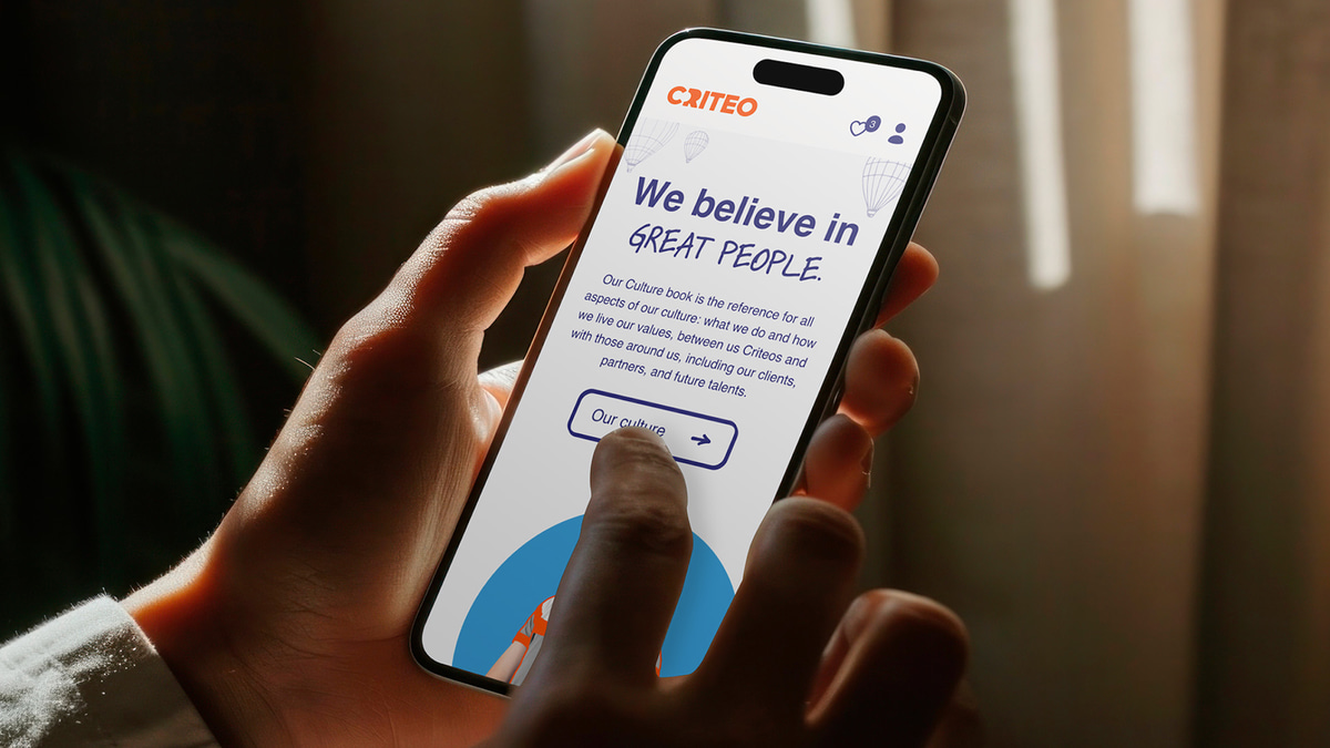 a hand holding a phone