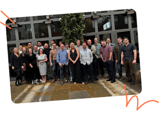 a group of people posing for a photo