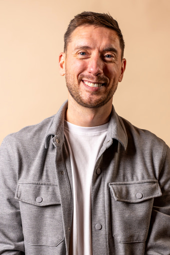 a person smiling at camera